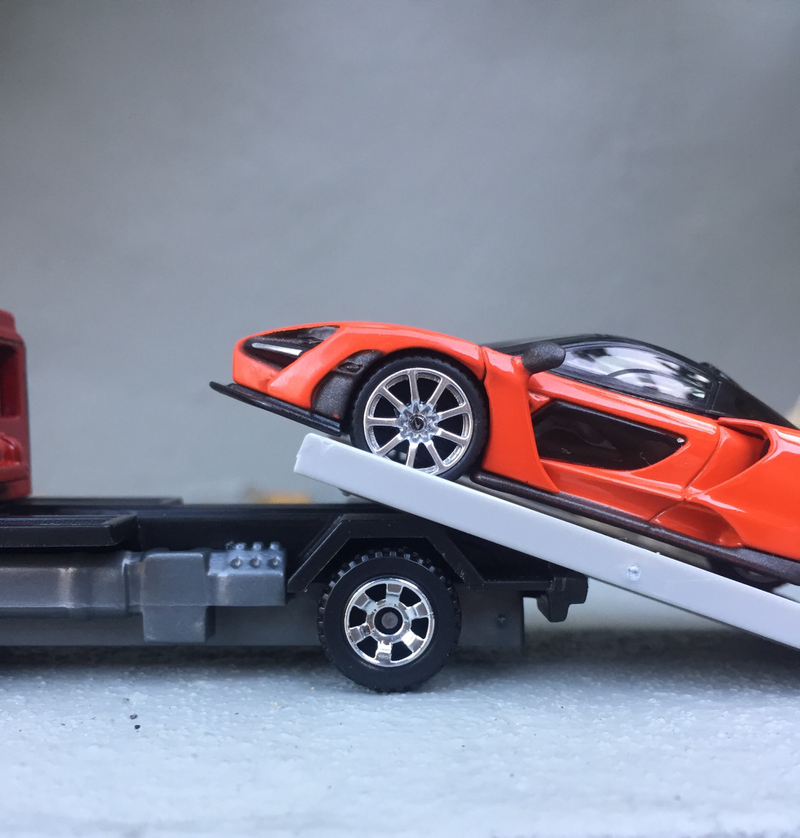 Illustration for article titled McLaren Monday - Mira Orange delivery with Matchbox Flatbed King!